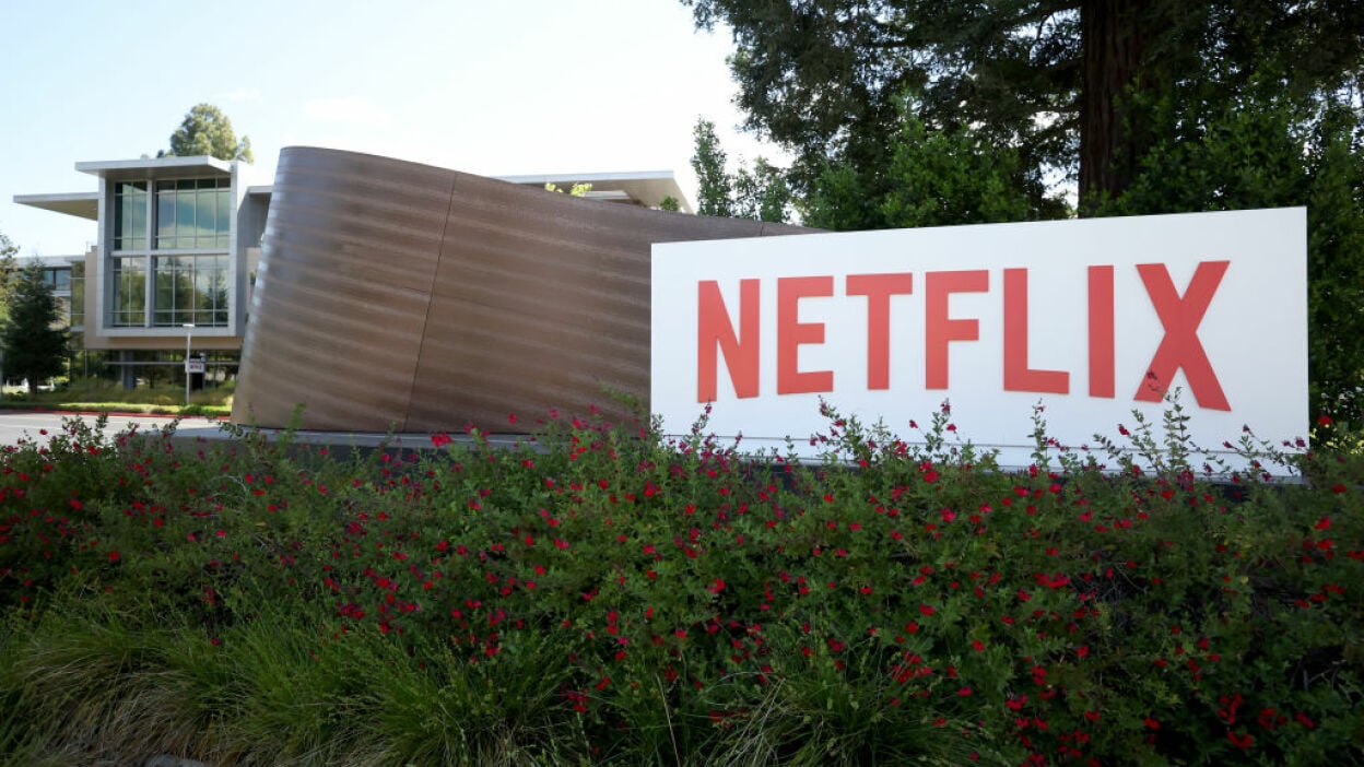 A sign is posted in front of Netflix headquarters in Los Gatos, California.