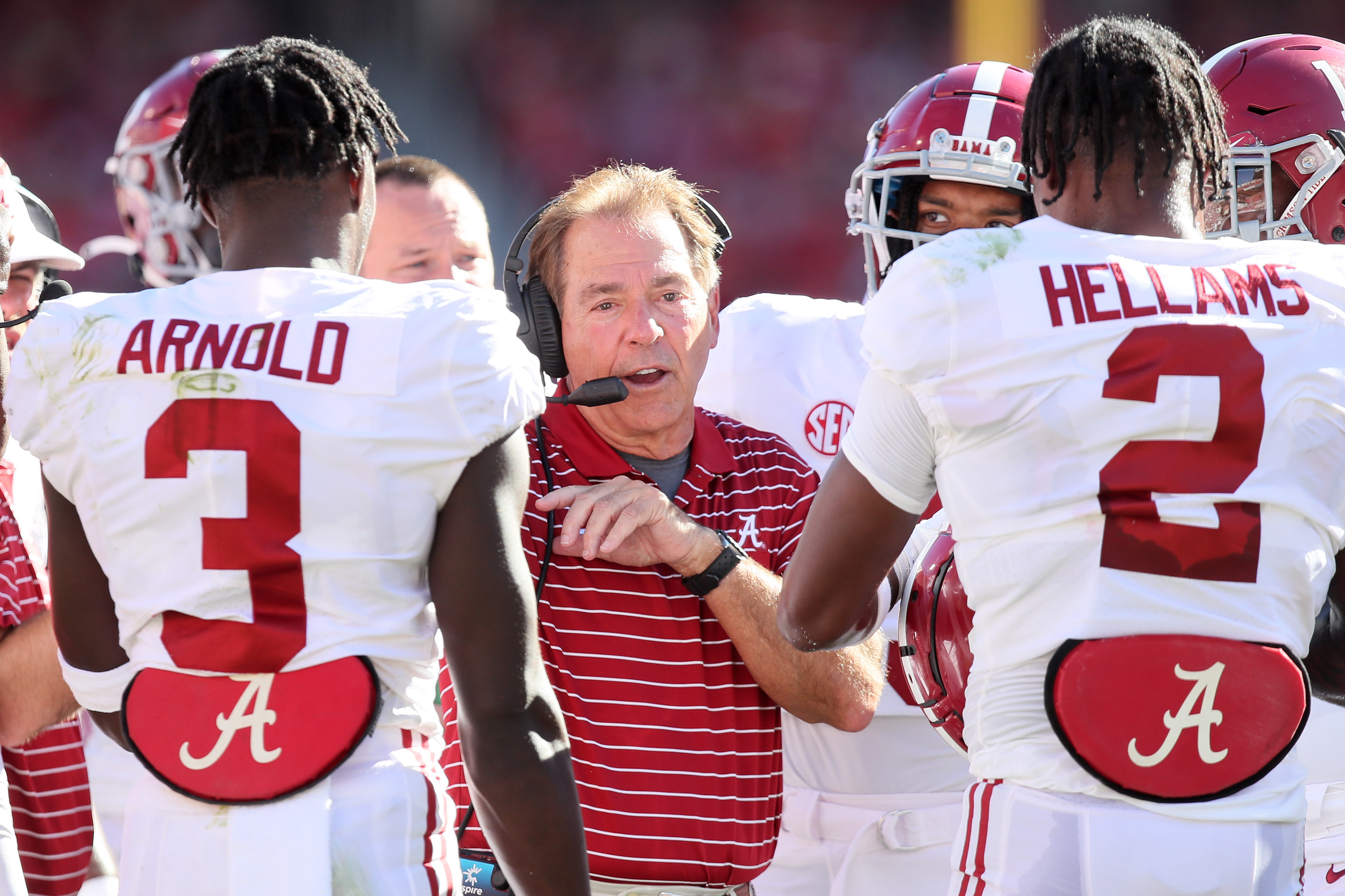 Oct 1, 2022; Fayetteville, Arkansas; Alabama Crimson Tide head coach Nick Saban talks to his players in the second quarter against the Arkansas Razorbacks at Donald W. Reynolds Razorback Stadium. Nelson Chenault-USA TODAY Sports